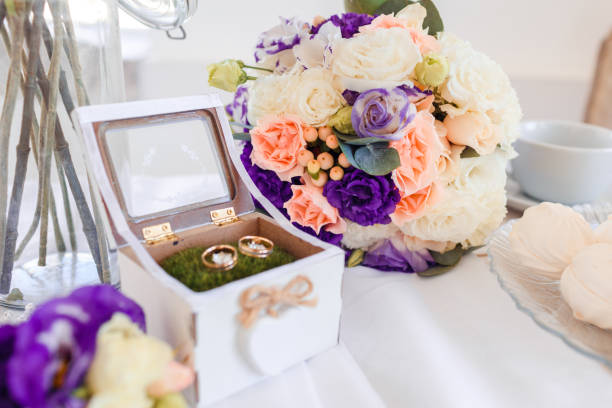 istock Delicate classic wedding rings for bride and groom. 1188674253