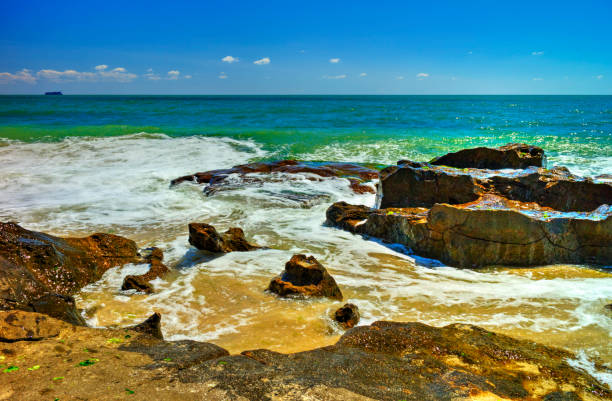 istock Beautiful landscape with rocks and sea waves on a beach 1188678610