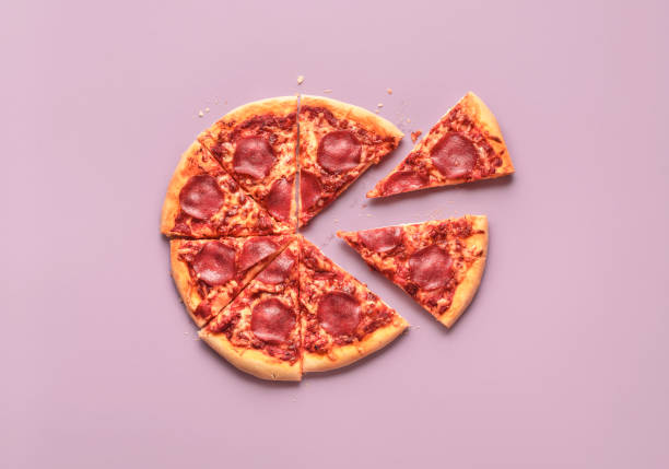 istock Pepperoni pizza sliced and two pieces separated. Pizza slices 1188679613