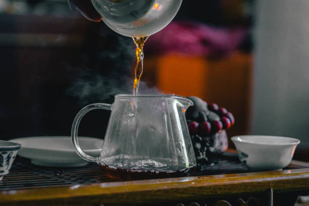 istock tea ceremony, pouring tea, a Chinese tea closeup. selective focus 1188682255