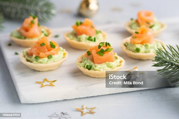 Canapes With Smoked Salmon Cream Cheese And Avocado On Light Background With Space For Text Christmas And New Year Holidays Background Concept Starters Snacks Recipe Ideas Stock Photo - Download Image Now