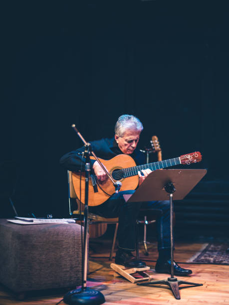 istock Male guitarist performing on the stage 1188685278