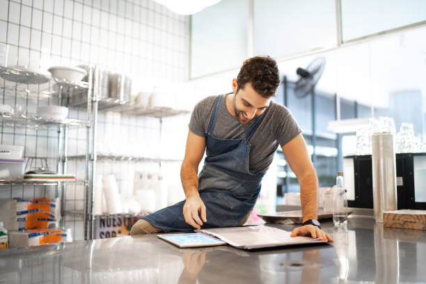 istock Business owner checking kitchen supplies 1188686915