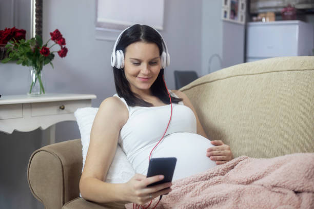 istock Pregnant woman at home 1188689851