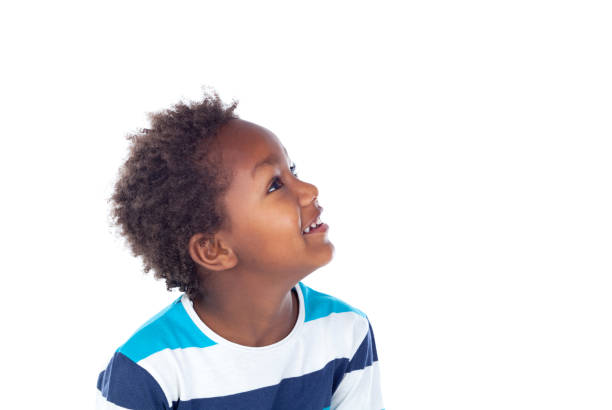 istock Adorable afroamerican child looking up 1188692671