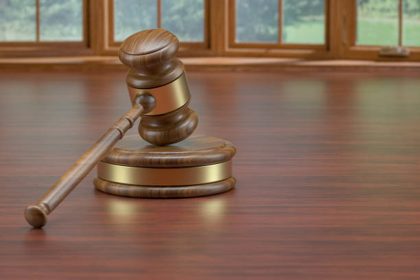 3d rendering of Gavel on wooden desk. Justice concept.
