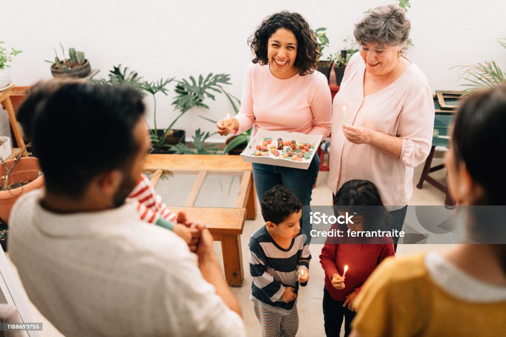 Mexican Family doing Las Posadas. Nativity scene Mexican Family doing Las Posadas. Re-enactment of a Christian scene of the Bible, Mary and Joseph looking for shelter. Latin American and Hispanic Ethnicity Stock Photo
