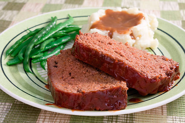 istock Dinner consisting of meat loaf green beans and mash 118869858