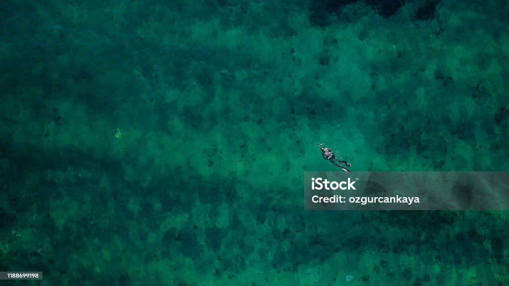 Aerial drone view: spearfishing at sea DCIM\100MEDIA\DJI_0022.JPG Fishing Stock Photo