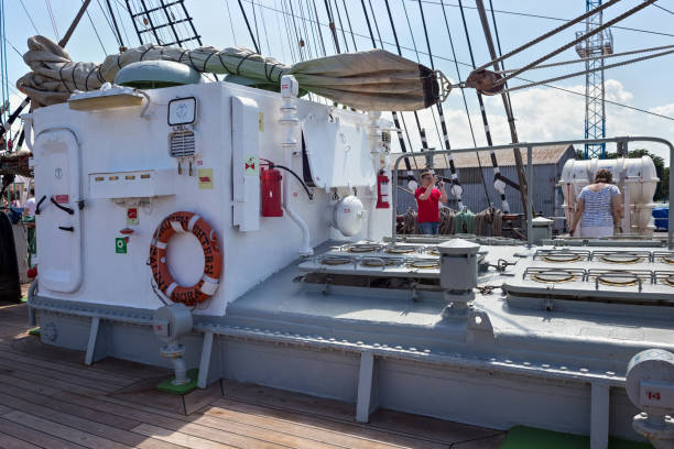 Metal deckhouse on the barque Kruzenshtern (prior Padua) moored in the Kaliningrad Sea Port. The ship launched in 1926 and was surrendered to the USSR in 1946. KALININGRAD, RUSSIA - JUNE 19, 2016: Metal deckhouse on the barque Kruzenshtern (prior Padua) moored in the Kaliningrad Sea Port. The ship launched in 1926 and was surrendered to the USSR in 1946. krusenstern stock pictures, royalty-free photos & images