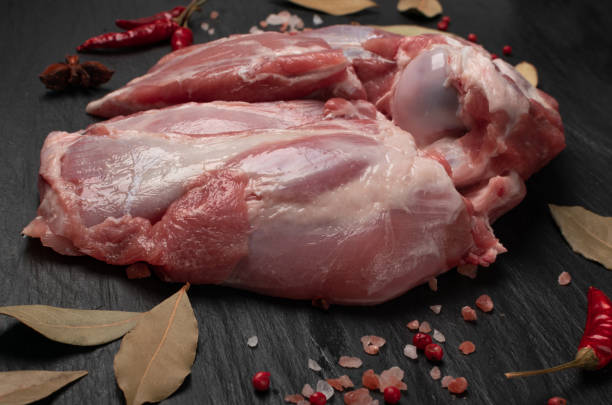 istock Fresh raw beef steak on black stone background 1188701410