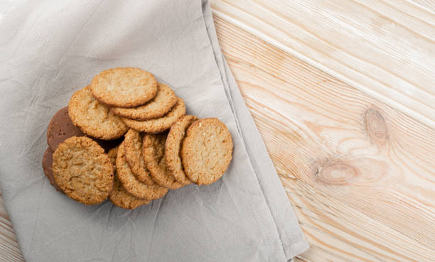 istock Thin Oatmeal Cookies, Healthy Cereal Crackers with Chocolate 1188701480
