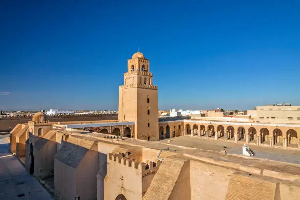 Tunisia - Kairouan - The panoramic view of fortress-like Great Mosque aka the Mosque of Sidi-Uqba and its minaret (built 9th century) are listed as UNESCO World Heritage and is one of the most impressive and largest Islamic monuments in North Africa