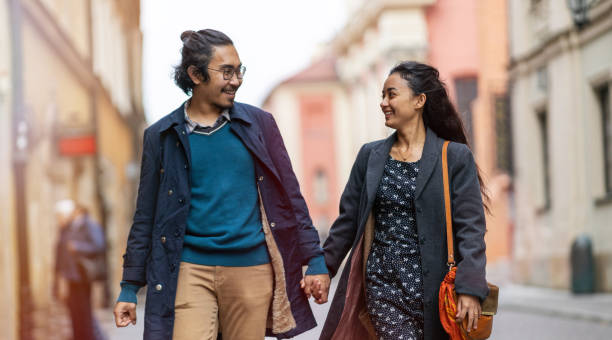 istock Happy young couple, walking through the old city 1188703366