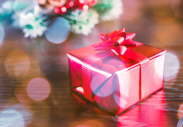 istock Christmas gift and sparkling lights. 1188704234