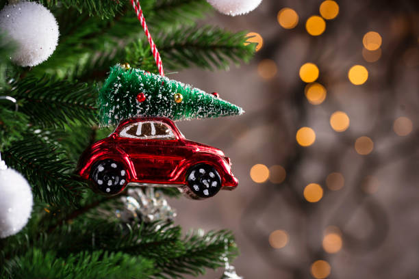 istock Christmas tree toy in shape of red car 1188704535