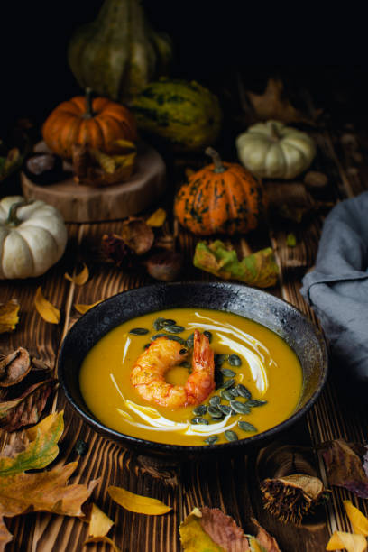 istock Pumpkin squash soup with seeds, olive oil 1188704637