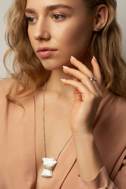 istock Beautiful blonde model in beige blouse 1188704695