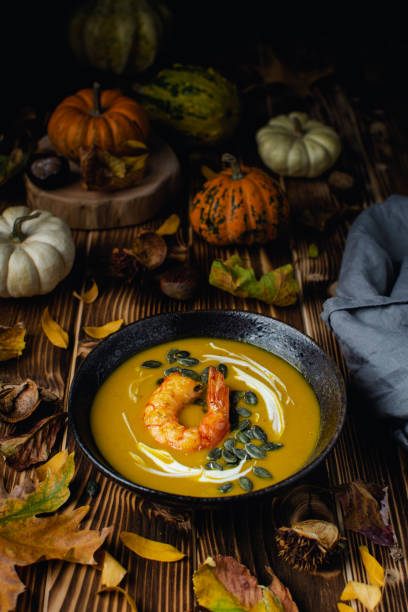 istock Pumpkin squash soup with seeds, olive oil 1188707122