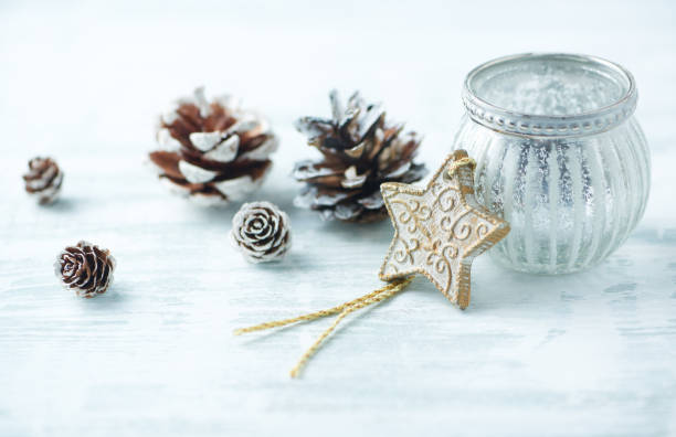 istock Christmas ornament (wooden Christmas Star) on bright wooden background. Close up. Copy space. 1188707428