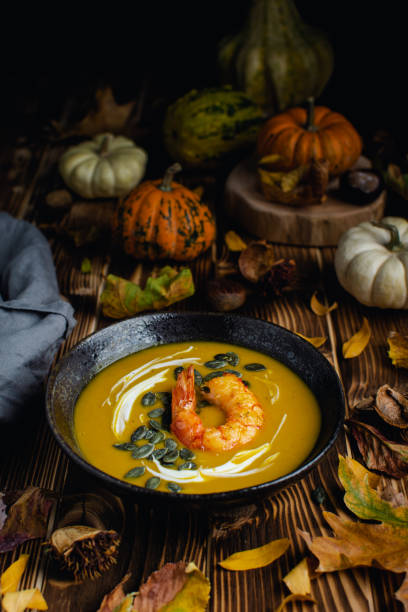 istock Pumpkin squash soup with seeds, olive oil 1188707488