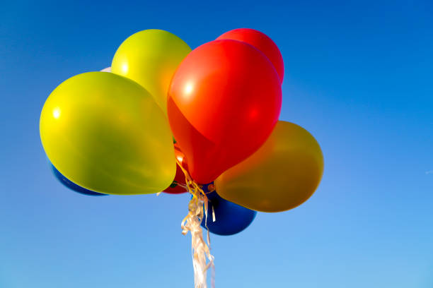 istock image of colorful balloons with sky background 1188709936