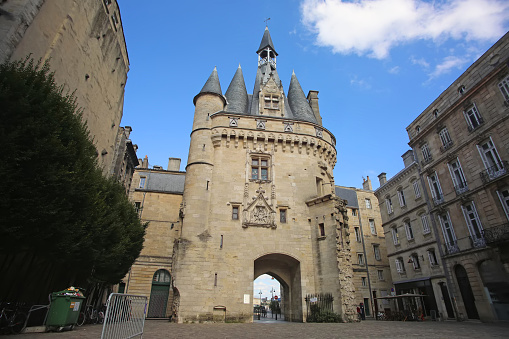 The door or gate Porte Cailhau is beautiful gothic architecture from the 15th century. It is both a defensive gate and triumphal arch. Bordeaux, France.