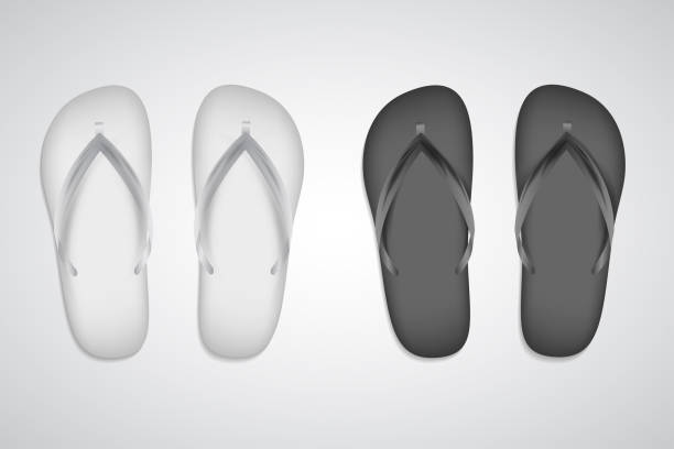 White and black slippers realistic set template isolated on white background. Vector flip flops, beach clothing accessory. Copyspa for branding. Summer pool shoes. Tropical rubber footwear closeup. White and black slippers realistic set template isolated on white background. Vector flip flops, beach clothing accessory. Copyspace for branding. Summer pool shoes. Tropical rubber footwear closeup. flip flop sandal beach isolated stock illustrations