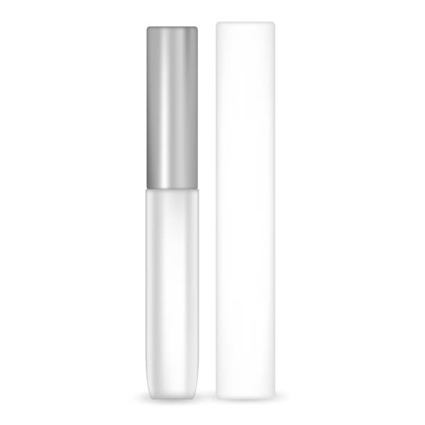 istock Vector lipstick balm, gloss mock-up with metallic cap and cardboard packaging box isolated on white background. Copy space for creative design and logo. Luxurious beauty product for lip skin care. 1188710891