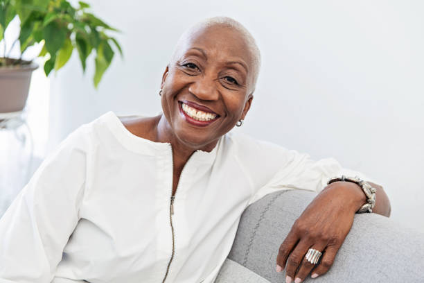 istock Senior Woman Relaxing on a Couch 1188711247