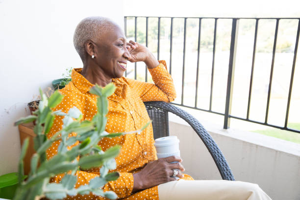 istock Woman Relaxing on Her Balcony 1188711267