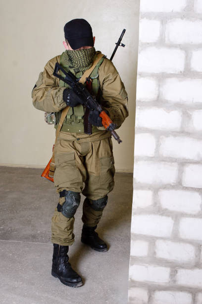 istock guerillas sniper with sniper rifle inside the building 1188714827