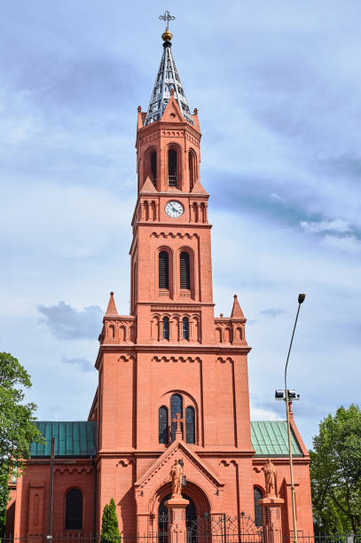 istock belfty of neo-Gothic brick Catholic church 1188715711
