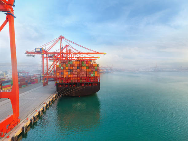 istock Aerial view cargo ship at commercial port. 1188715784