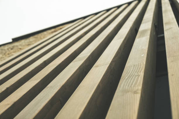 istock Building facade with modern wooden vertical planks 1188717211