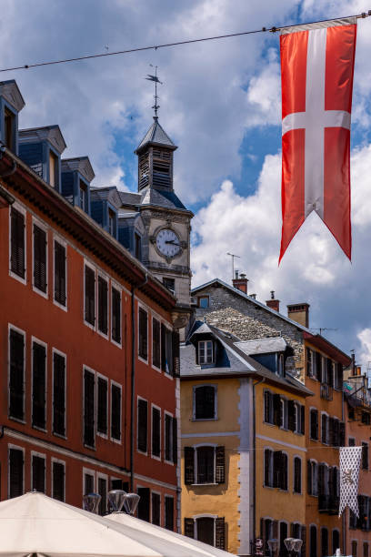 Buildings of Place Saint Leger and Clock Tower (Chambery; Auvergne-Rhône-Alps; Savoy; France). stock photo