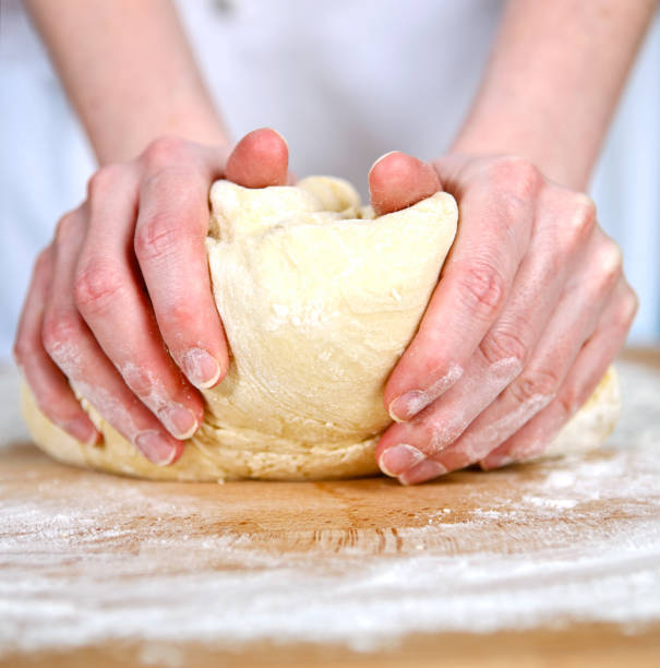 istock Cook knead the dough 1188720066