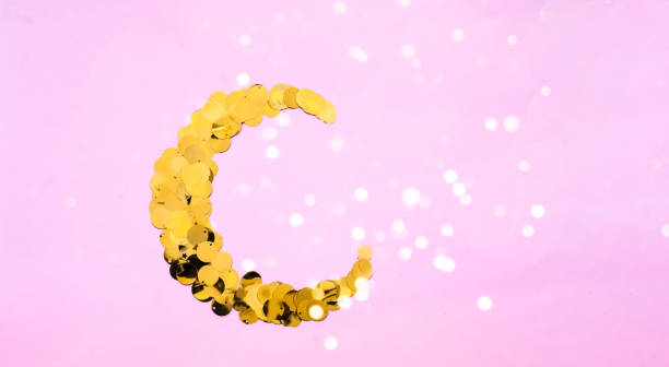 istock Festive background with golden sparkles Muslim crescent shaped. Blurred effect. Close-up 1188724857