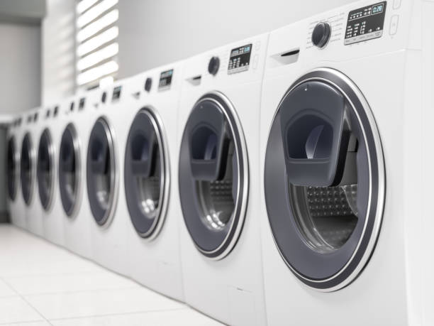 istock Row of laundry machines 1188728272