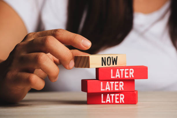 istock Now and later with wood block 1188737915