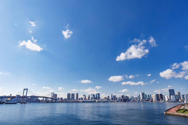 istock Urban buildings and blue sky on the water 1188743078