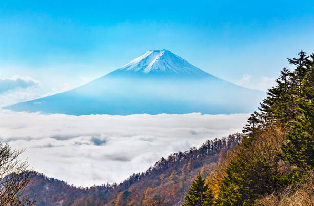istock Mount Fuji above the blue sky and clouds 1188744836