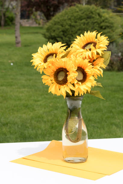 istock Sunflowers bouquet on table in the garden 1188748547
