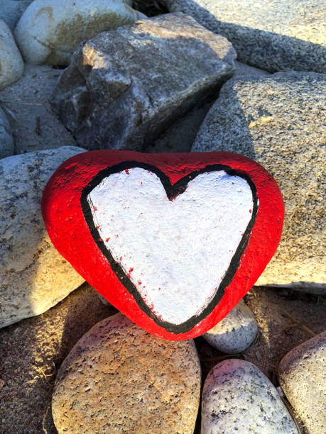 istock Stone heart in a stone heap 1188751355