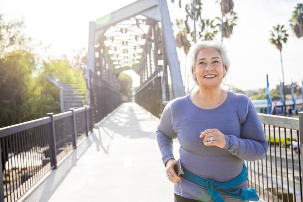 istock Mexican Woman Jogging on a Trail 1188757032