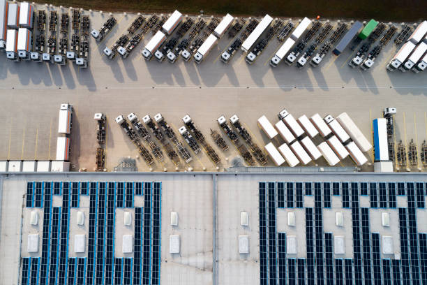 istock Aerial View of Trucks Loading at Logistic Center, Distribution Warehouse 1188758777