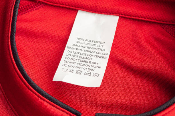 istock White laundry care washing instructions clothes label on red jersey polyester sport shirt 1188759366