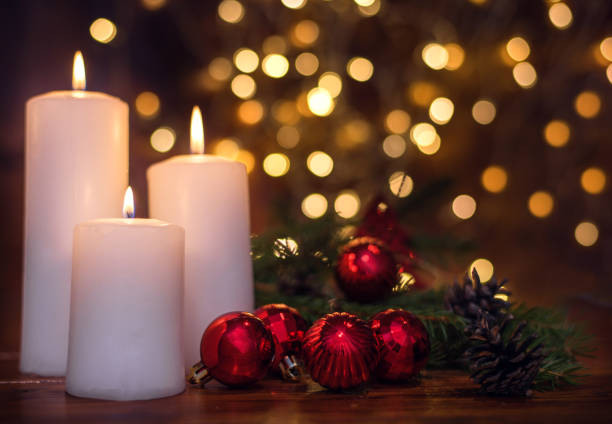 istock Tree branches, cones, bokeh lights, candles, Christmas balls. Preparation for the New Year 1188759937