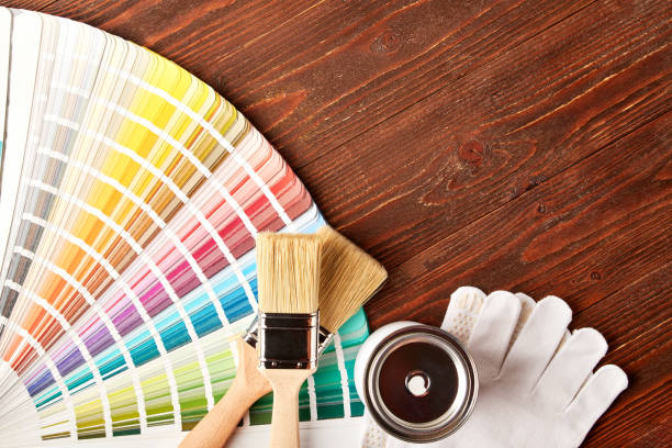 istock Painting tools on wooden table 1188760093