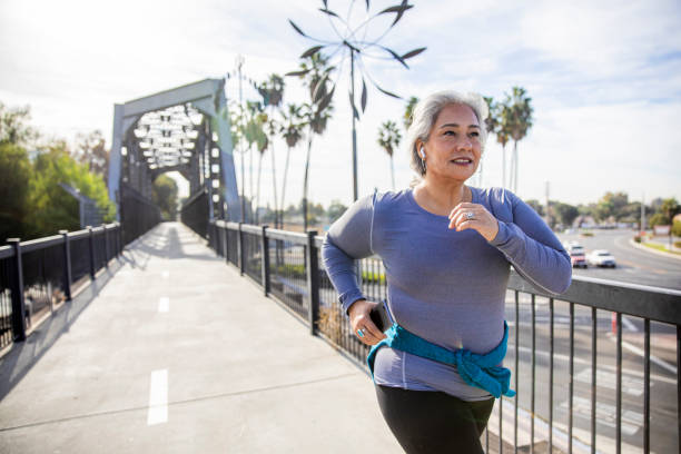 istock Mexican Woman Jogging on a Trail 1188761463